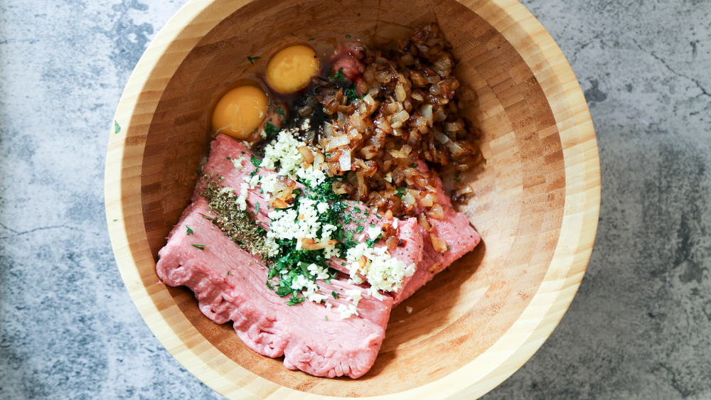 turkey burger ingredients placed in bowl