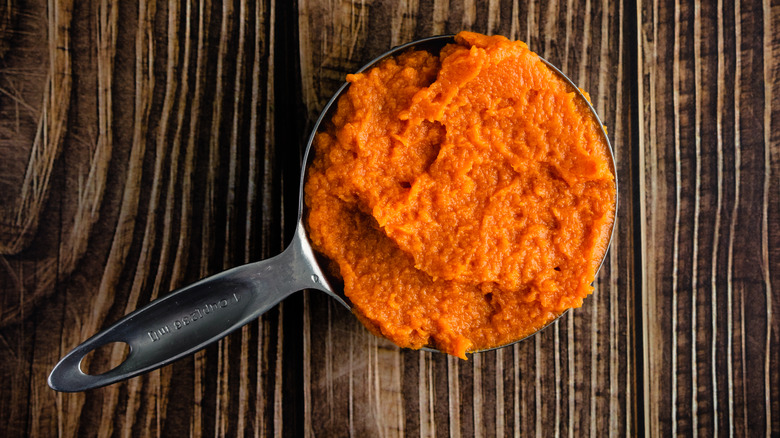 Measuring cup with pumpkin purée