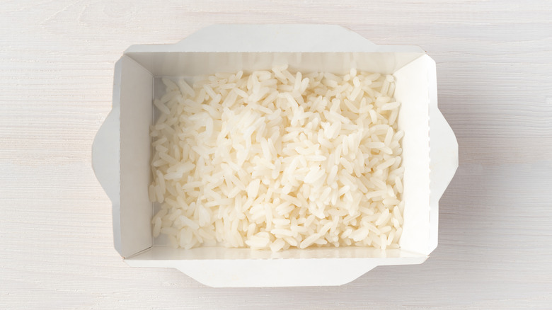 rice in cardboard takeout box