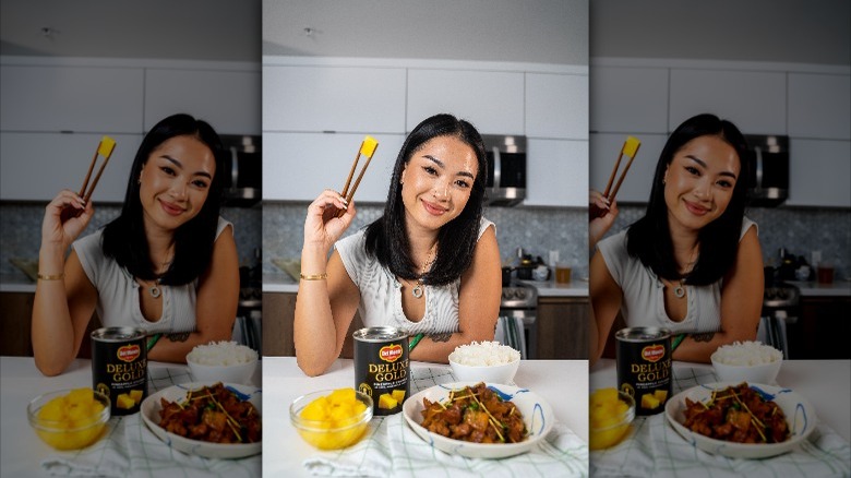 Tway Nguyễn smiling with pineapple