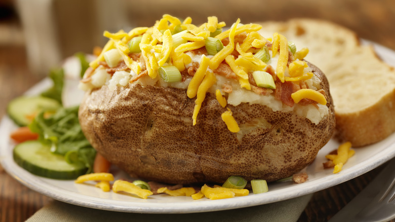 Twice-baked potato on white plate