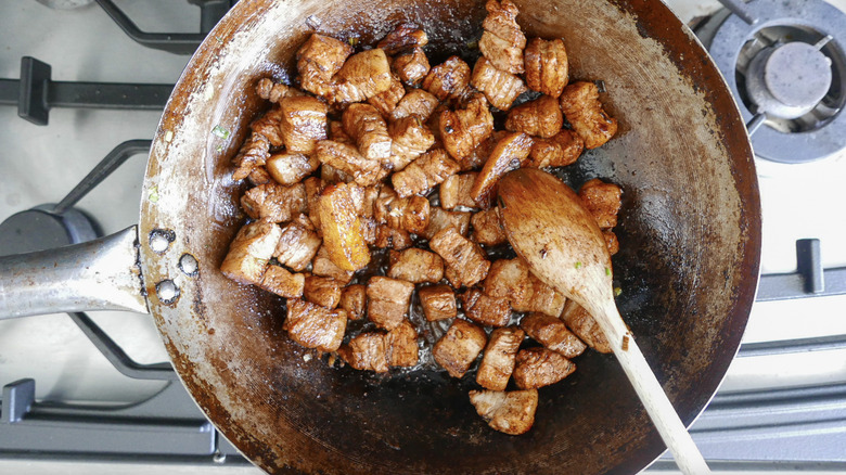 Stir fry pork in soy mixture