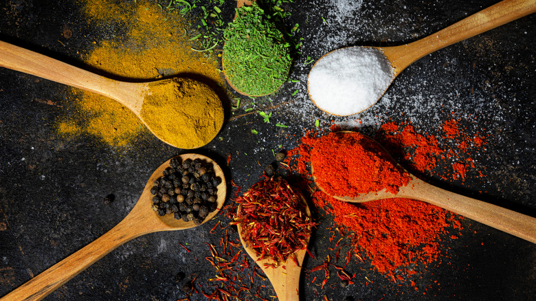 A variety of spices in spoons