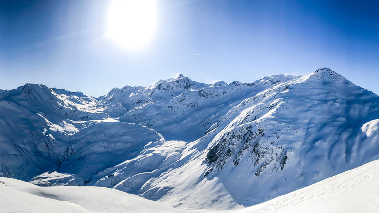 Snowy mountains sunny weather