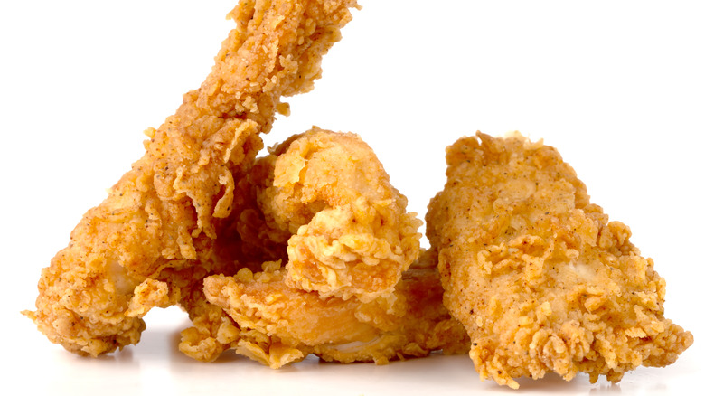 crispy chicken strips white background