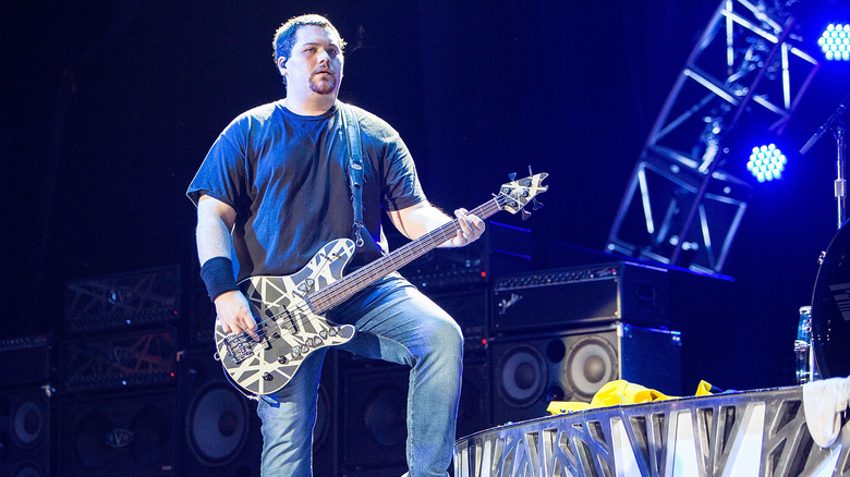 Wolfgang Van Halen on stage holding bass guitar