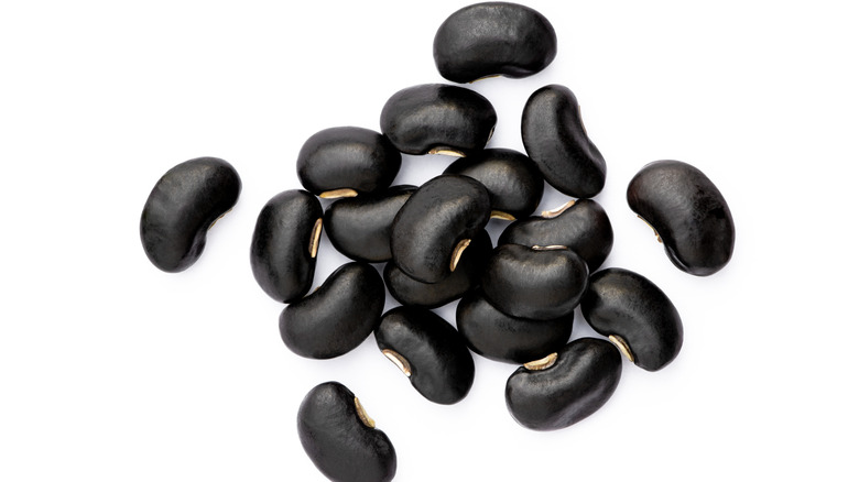 Black beans on white background