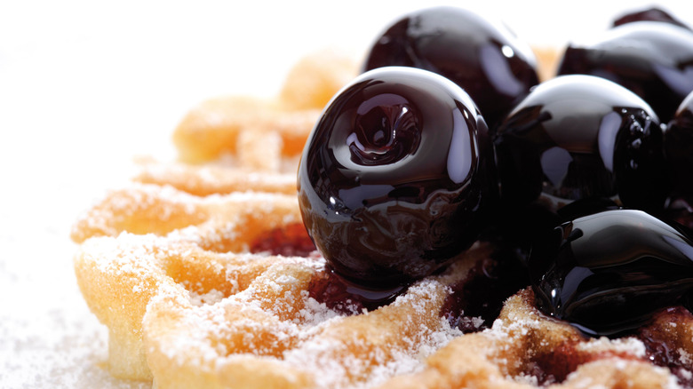 Waffles topped with Amarena cherries