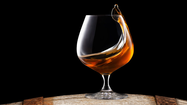 brandy snifter on a barrel 