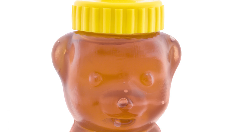 honey bear plastic bottle with clover honey