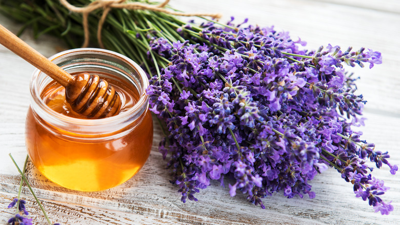 jar of honey with lavender flowers