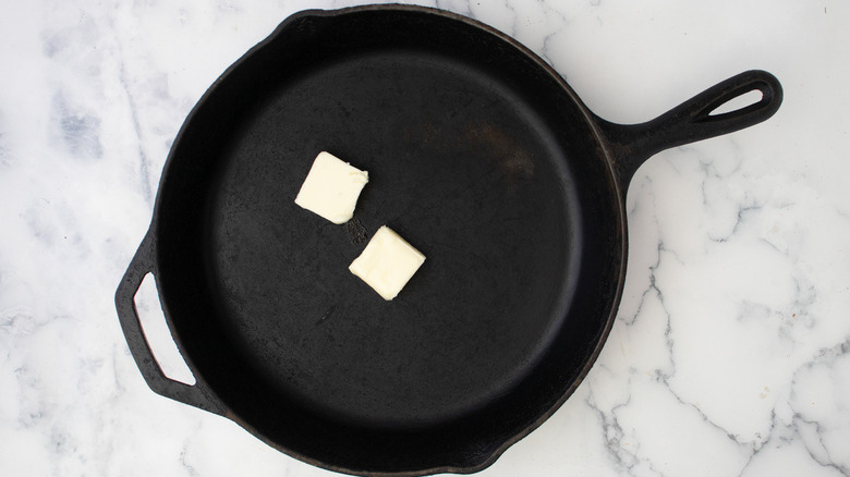 butter in cast iron pan