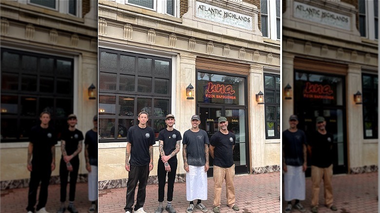 People standing by restaurant exterior