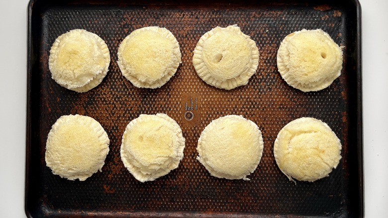 circular sandwiches in a baking pan