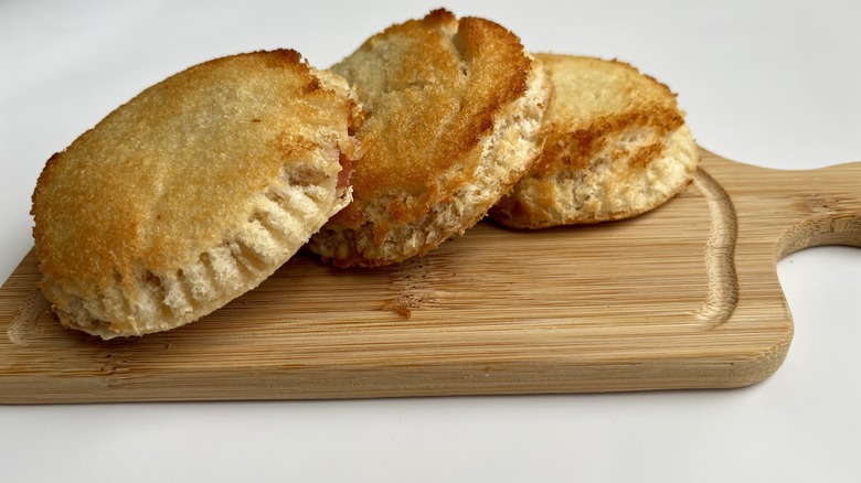 circular sandwiches on a wooden board