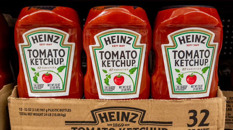 three bottles of Heinz ketchup in a box