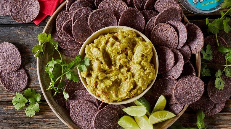 platter of Trader Joe's Organic Blue Tortilla Chips with guacamole