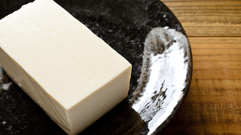 Silken tofu in black bowl