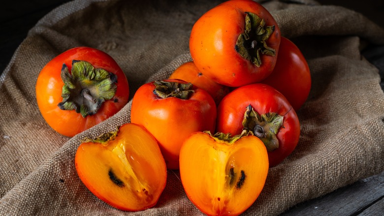 persimmons on a cloth