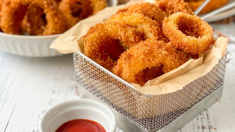 Onion rings in frying basket