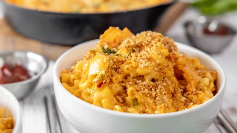 Kimchi mac and cheese in white bowl