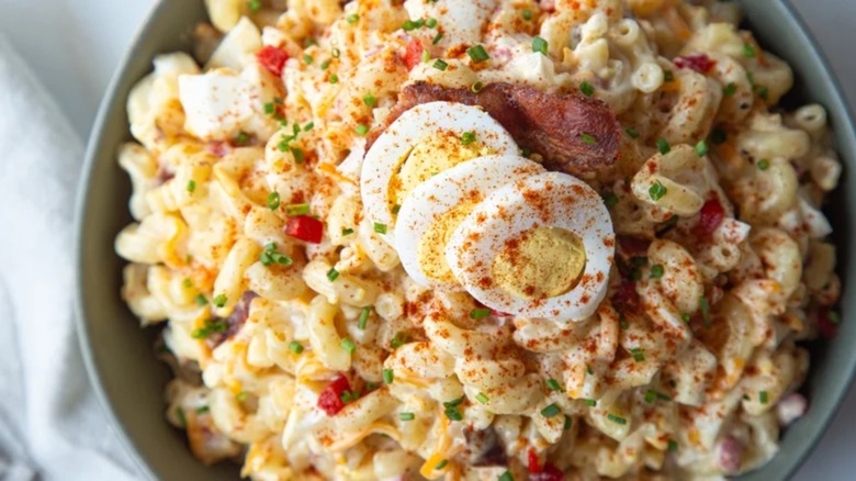 Deviled egg pasta salad in gray bowl