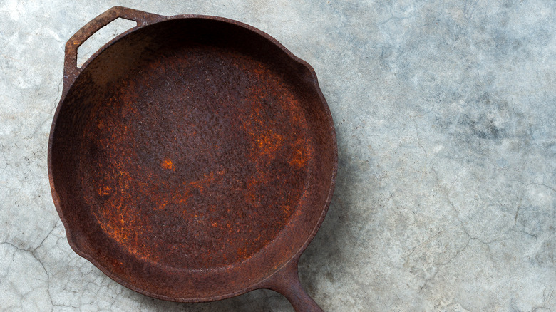 Rusty cast iron skillet