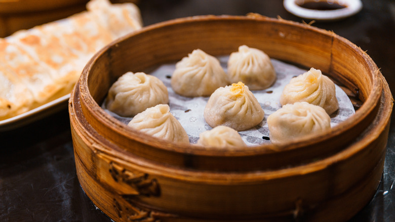 Soup dumplings in a bamboo basket