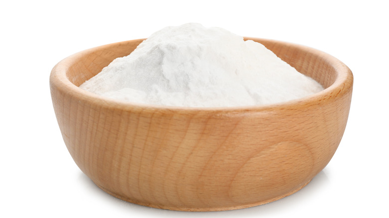 Wooden bowl of baking soda