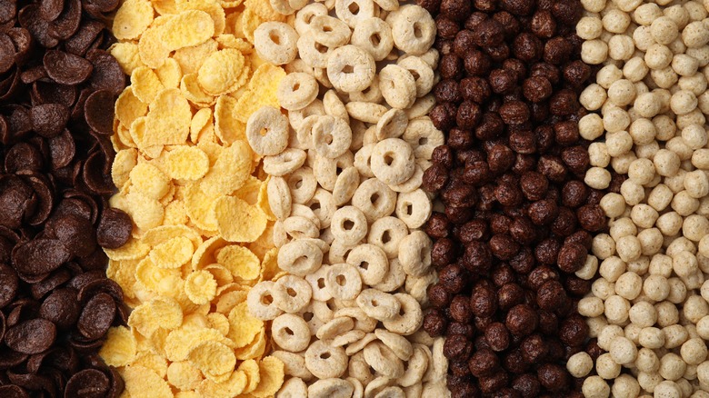 Various breakfast cereals laid out in rows