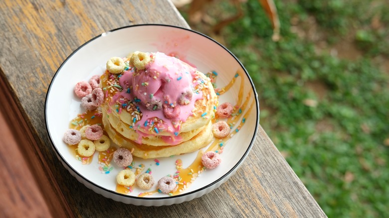 Pancakes topped with breakfast cereal