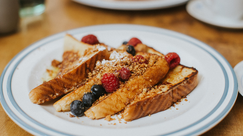 Slices of French toast on plate