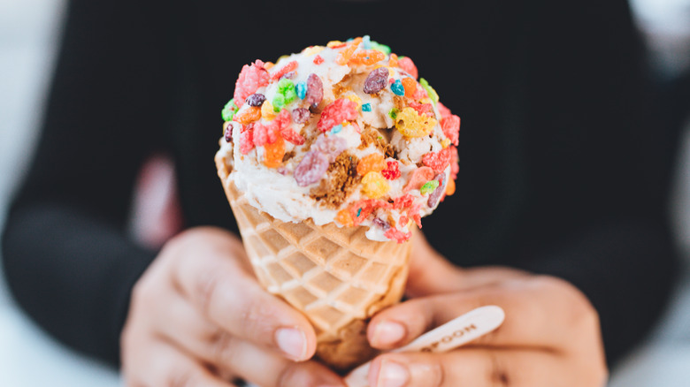 Ice cream cone topped with breakfast cereal