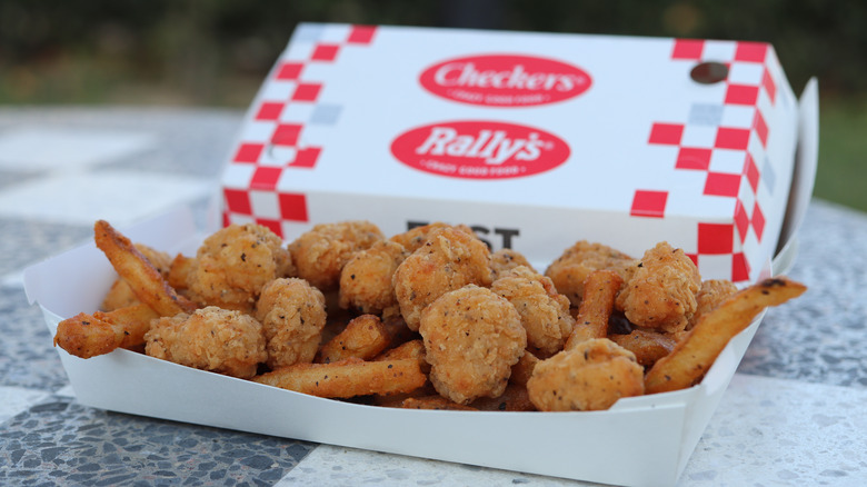 Checkers boneless wings and fries in boat 