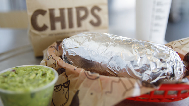 Chipotle burrito with a side of guac 