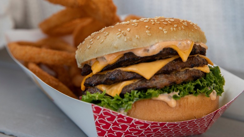 Hardee's burger and fries in boat 