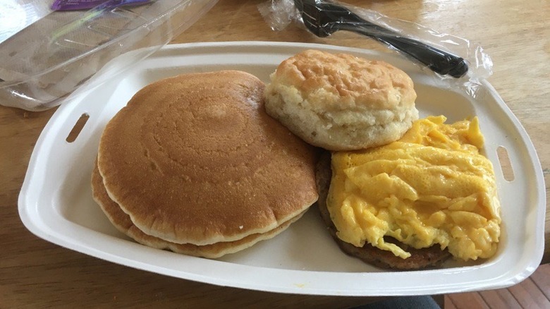 McDonald's platter with pancakes, eggs and biscuit