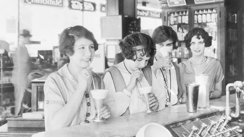 vintage photo women drinking soda