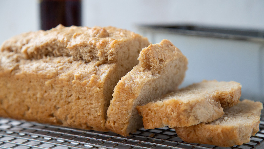 sliced beer bread on a wire cooling rack