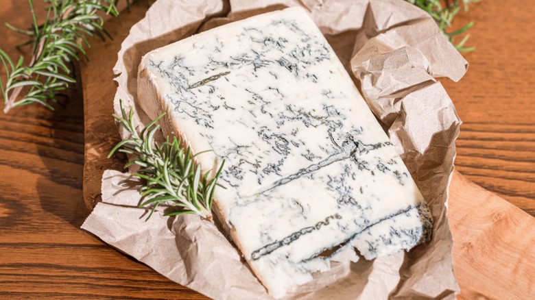 gorgonzola with rosemary in brown bag
