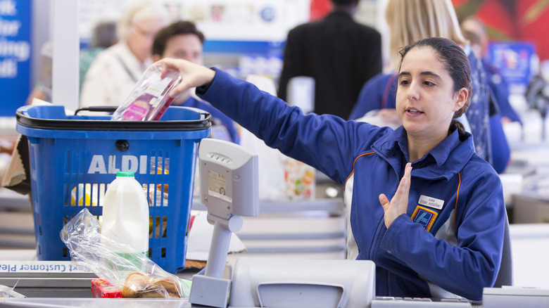 aldi cashier scanning items