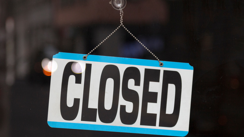 closed sign on store window