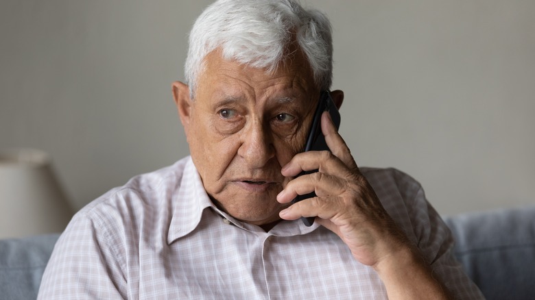 older man on cell phone