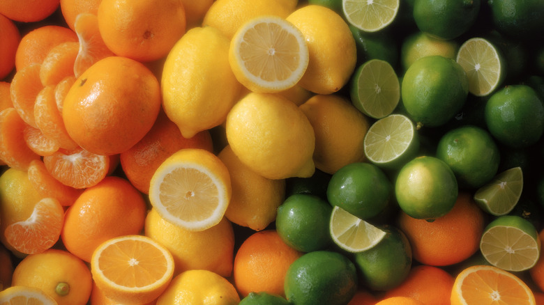 Pile of oranges, limes, and lemons