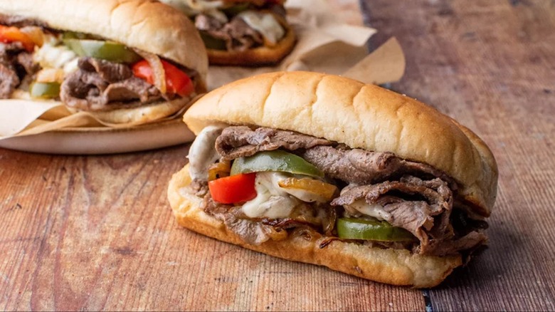 Philly cheesesteak on wooden counter