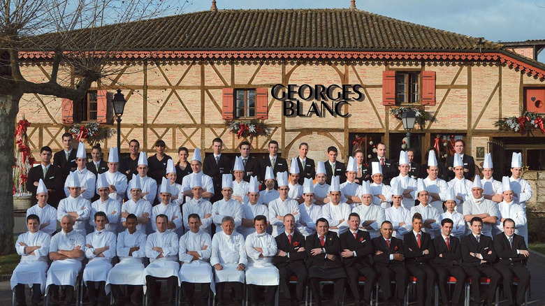 Staff posing outside Georges Blanc