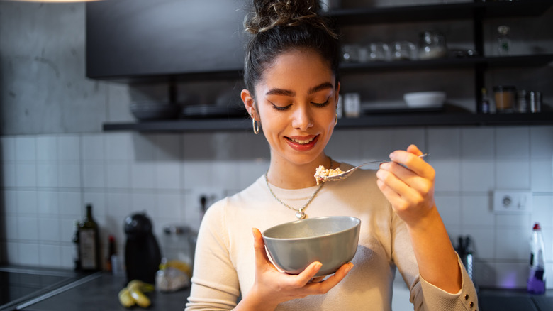 woman eating oatmeal