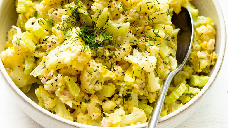 Mixture of cooked cauliflower with herbs.