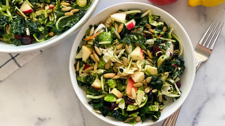 Salad of kale, apples, and pine nuts