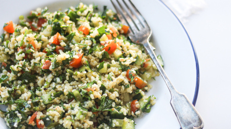 Tabbouleh salad with bulgur, herbs, and diced tomatoes